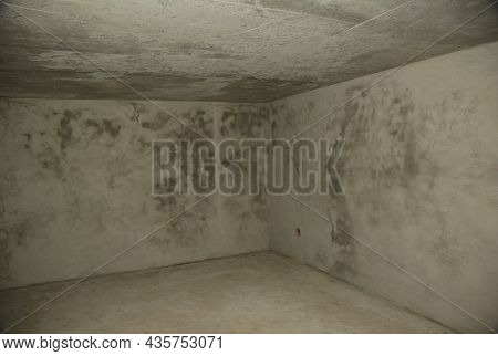 An Empty, Concrete Bomb Shelter, Nuclear Fallout Shelter Built Under The House. Inside An Undergroun
