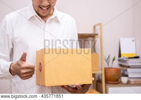 Asian Male Hand Writing Order Product List On Note For Online Customer In Warehouse Home Office Orde