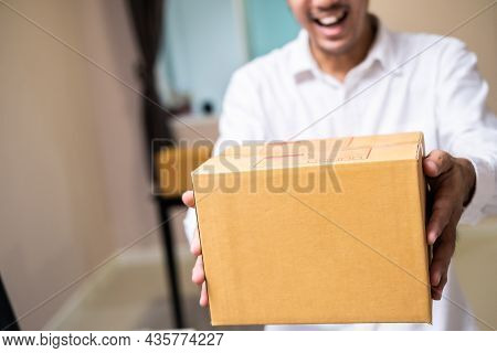 Asian Male Hand Writing Order Product List On Note For Online Customer In Warehouse Home Office Orde