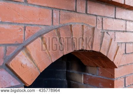 Fireplace Arch Laid Out Of Bricks Semi-circle Close-up Background Design