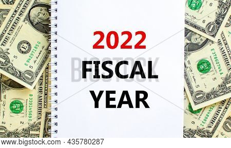 2022 Fiscal New Year Symbol. Words '2022 Fiscal Year', On White Note. Beautiful Background From Doll