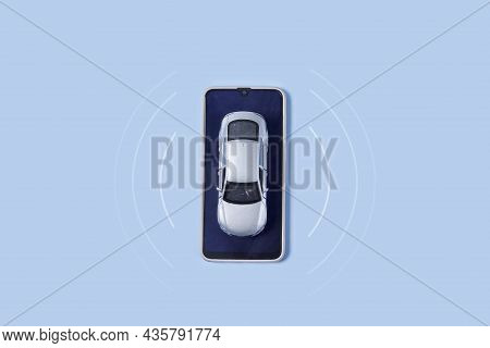 Car Toy And Mobile Phone On Blue Background. Automobile With Gps Tracking Pulsing Signal. A Vehicle 