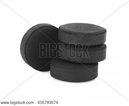 Activated Charcoal Pills On White Background. Potent Sorbent