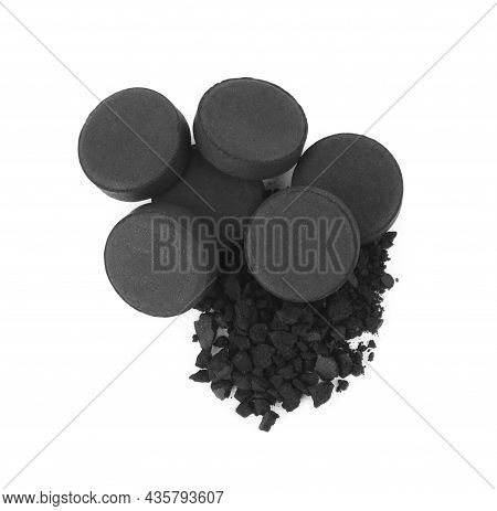 Activated Charcoal On White Background, Top View. Potent Sorbent