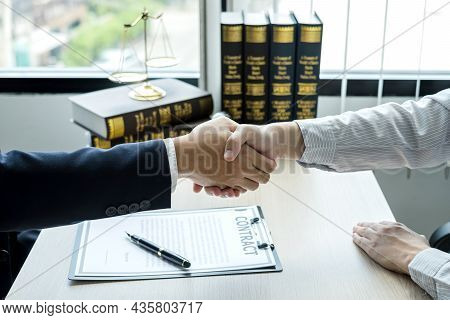 Shake Hand Professional Man Lawyers Work At A Law Office There Are Scales, Scales Of Justice, Judges