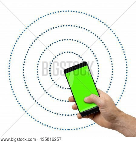 Man Holding Mobile Phone With Chromakey Screen And Wireless Internet Signal Against White Background