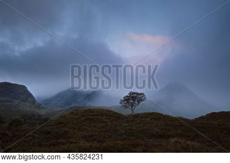 Morning View Of River With Waterfall And Cloud Covered Mountain Range. Scenic Summer Landscape With 