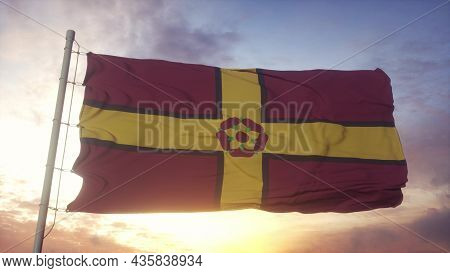 Northamptonshire Flag, England, Waving In The Wind, Sky And Sun Background. 3d Rendering