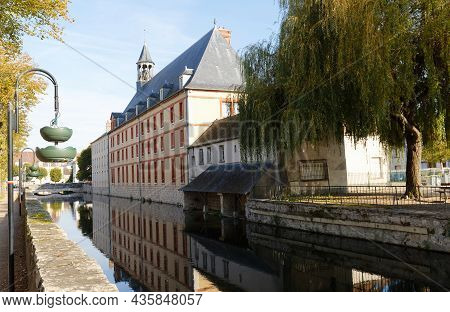 Scenic View Of Picturesque Houses Over Canal Curve In Medieval Town Of Nemours
