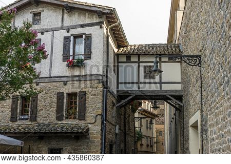 Facade of a medieval building in the center of Pamplona, ??medieval stone streets, typical and tourist alley of the city. Navarra Spain