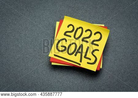 2022 goals reminder  - handwriting on a sticky note, New Year resolutions and goal setting concept