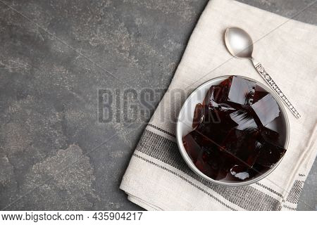 Delicious Grass Jelly Cubes On Grey Table, Flat Lay. Space For Text