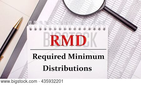 Desktop Magnifier, Reports, Pen And Notebook With Text Rmd Required Minimum Distributions. Business 