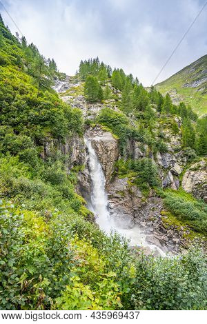 Wild Alpine Waterfall On Schlatenbach Mountain Stream. Gschloesstal Valley, Hohe Tauern National Par