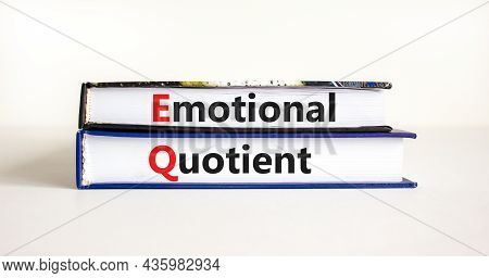 Eq Emotional Quotient Symbol. Concept Words 'eq Emotional Quotient' On Books On A Beautiful White Ta