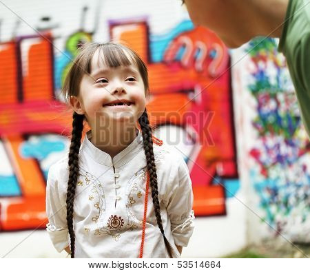 Boy And Girl Together On The Playground.