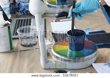Preparation of paint for car painting in car body shop laboratory