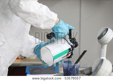 Preparation of paint for car painting in car body shop laboratory