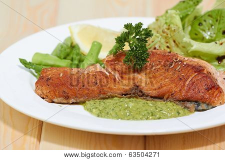 Grilled Salmon Steak With Lemon And Vegetables