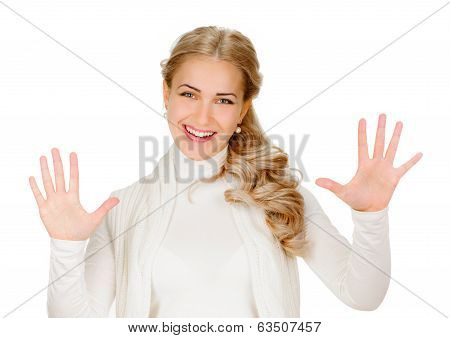 Portrait of smiling woman showing ten fingers