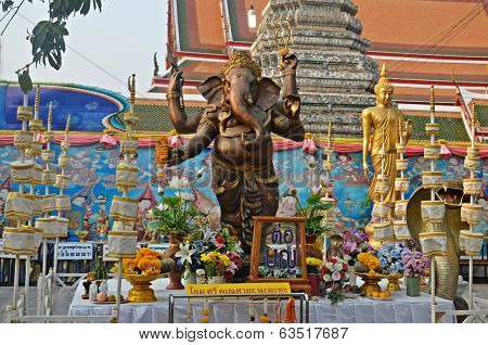 Ganesha Statue And Offerings