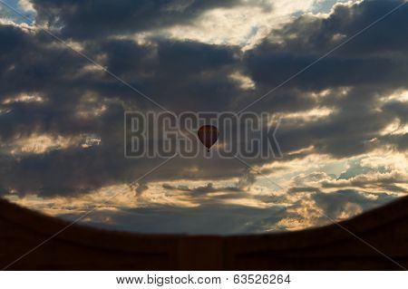 Silhouette Of Balloon In The Sky With Clouds