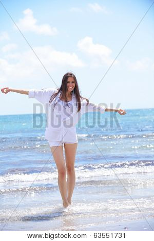 happy young couple having lanch at beautiful restaurant on by the sea on  beach