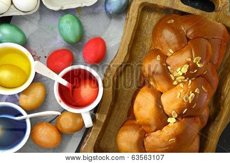 Easter sweet brioche, colored eggs and liquid dye
