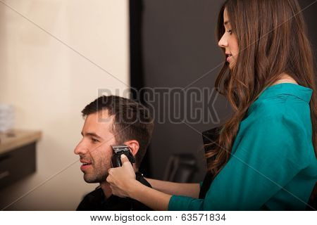Barber Trimming Sideburns