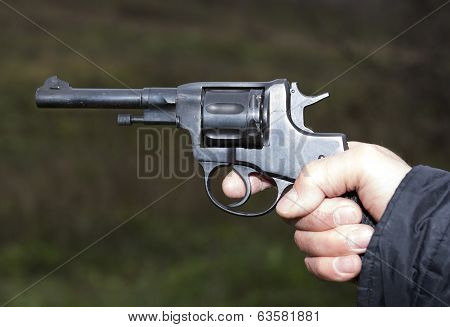 Pistol Nagant Revolver In Hand Gangster