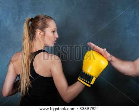 Female Boxer Practicing In The Boxing Ring