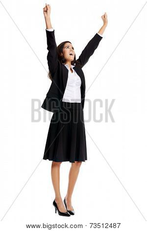 happy celebrating young businesswoman with success and suit
