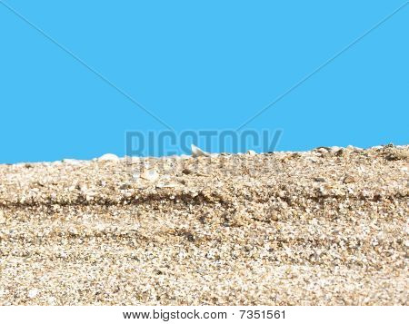 Sea sand and the blue sky.