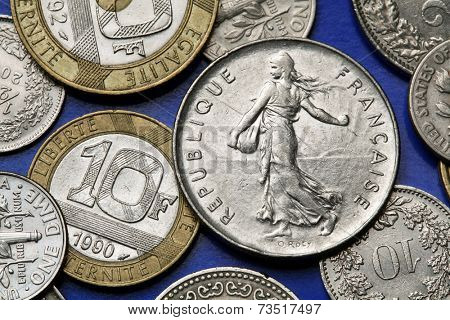 Coins of France. The sower designed by Oscar Roty depicted in the old five French franc coin.