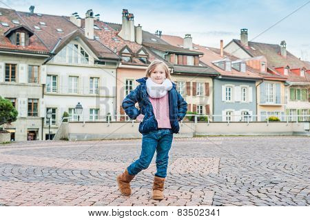 Outdoor portrait of a cute little girl