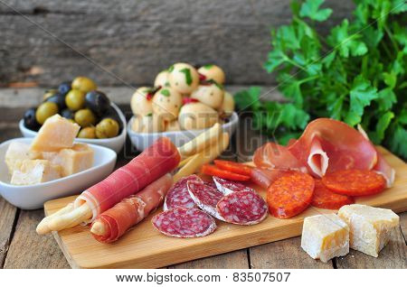 Antipasto, egg, olives, chesse, parma various appetizer food traditional