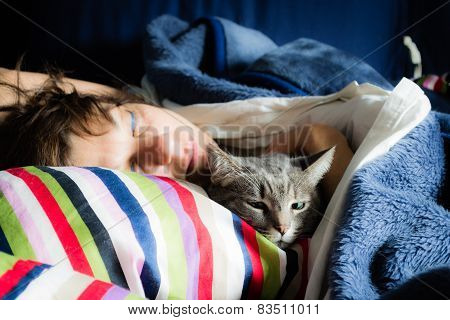 Woman Sleeping With Cat