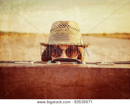 Hipster with suitcase, vintage image