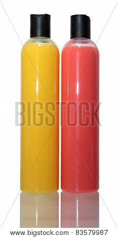 colored plastic bottles with liquid soap and shower gel.