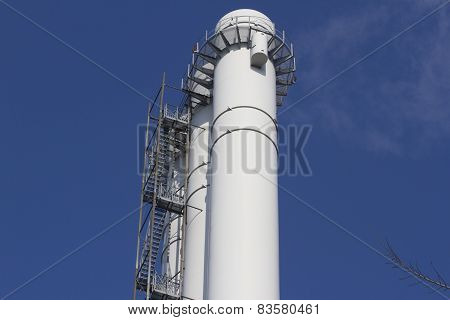 triple tube against the blue sky
