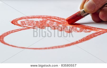 drawing a sketch of the red heart