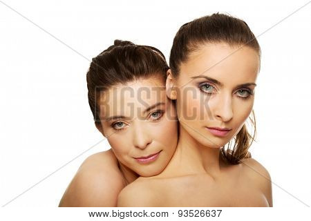 Two attractive sisters with make up.