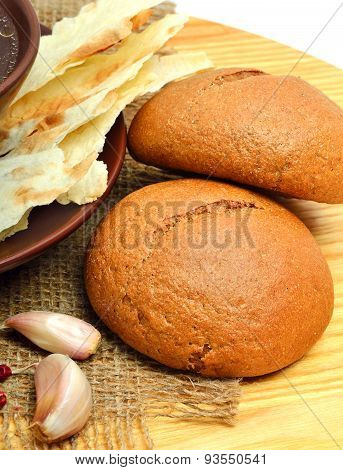 Rolls With Garlic And Lavash On The Cutting Board