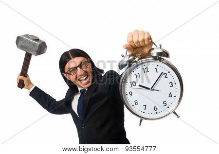 Handsome businessman holding hammer and alarm clock isolated on white