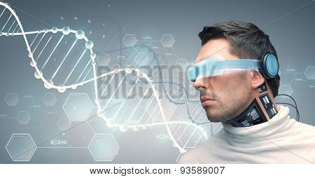 people, technology, future and progress - man with futuristic glasses and microchip implant or sensors over gray background and dna molecules with chemical formulas
