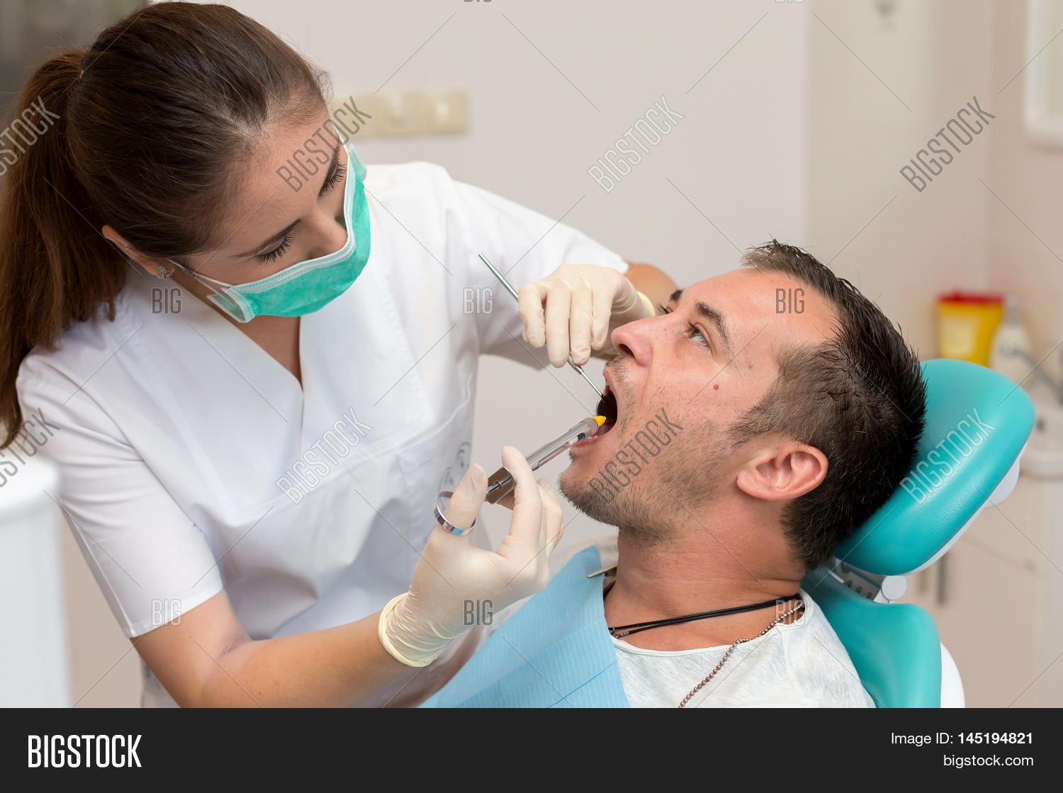 Dentist Giving Image & Photo (Free Trial) Bigstock