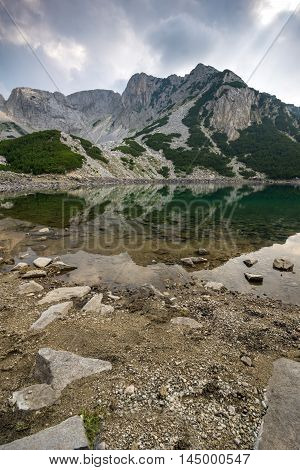 Landscape with Dark Clouds over Sinanitsa Peak and lake, Pirin Mountain, Bulgaria