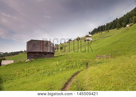 Summer landscape above the village in Moeciu de Sus - Bran, Romania