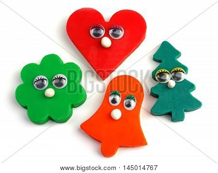 Plasticine figures on a white background - Children's games
