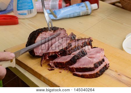 grilled meat is cut into individual slices